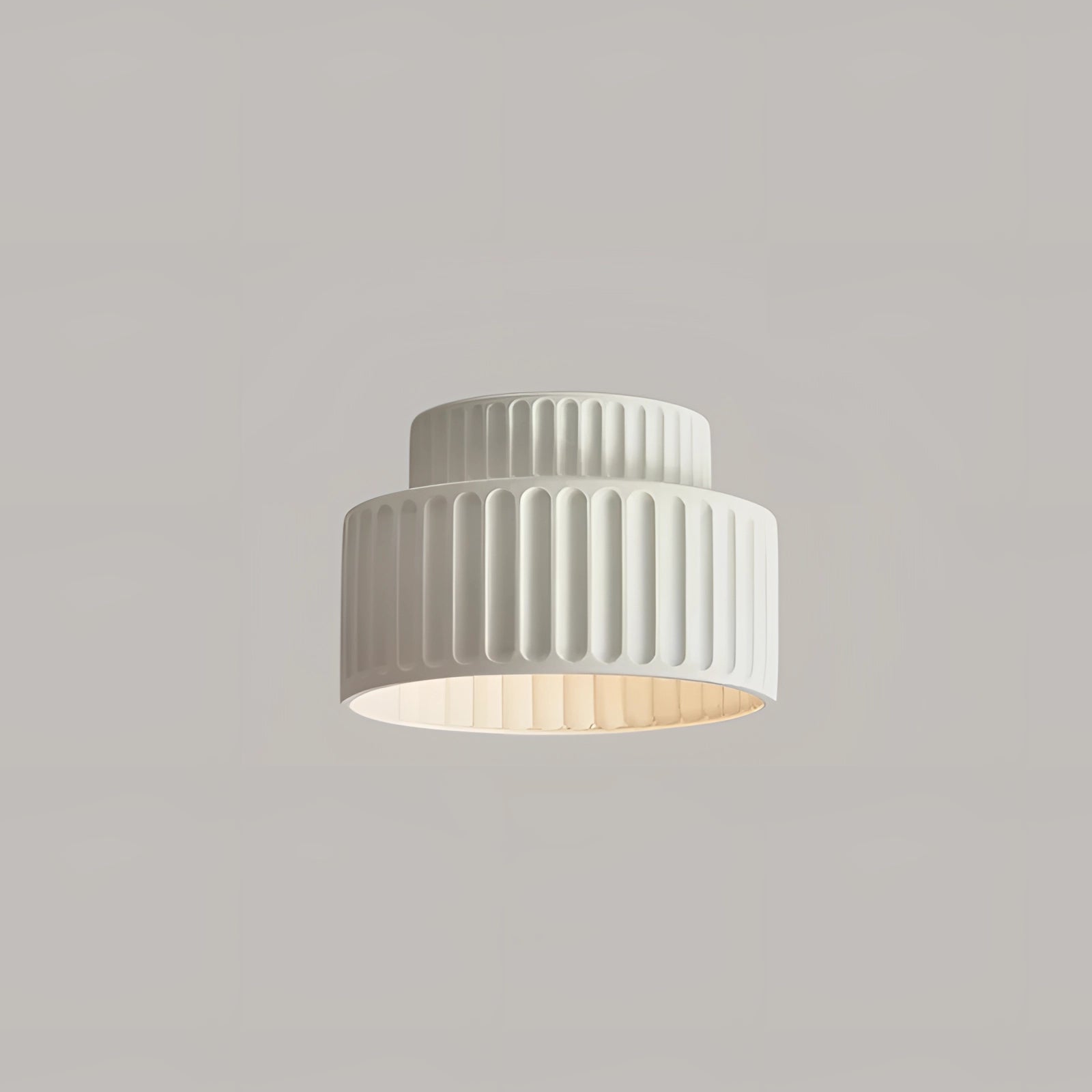 Ribbed LED Pendant Lamp in white with a warm white glow, featuring a modern cylindrical design and a sleek ceiling fixture.