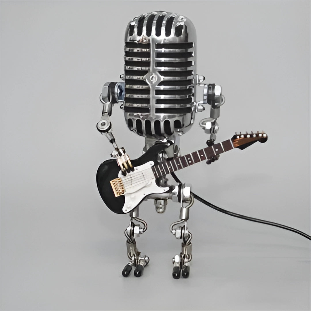 Robot musician figure made of metal holding a black guitar and a microphone, showcasing a blend of musical and artistic elements.