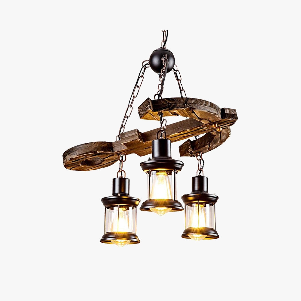 Rustic farmhouse chandelier featuring a wooden beam with industrial-style pendant lights, crafted with bronze and brass metal accents, hanging as a ceiling fixture.