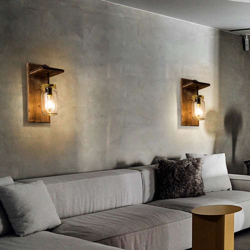 Rustic Mason Jar Wood Wall Sconce made from pine wood, mounted on a wooden wall with a vintage farmhouse lighting design.