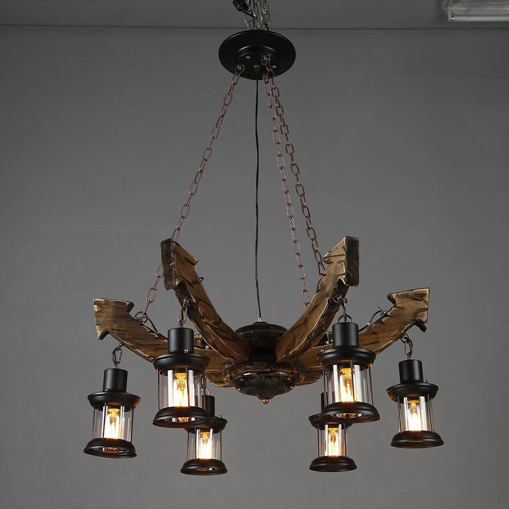 Rustic metal and wood chandelier featuring an amber glow with multiple light bulbs, suspended from the ceiling as a cabin decor lighting fixture.