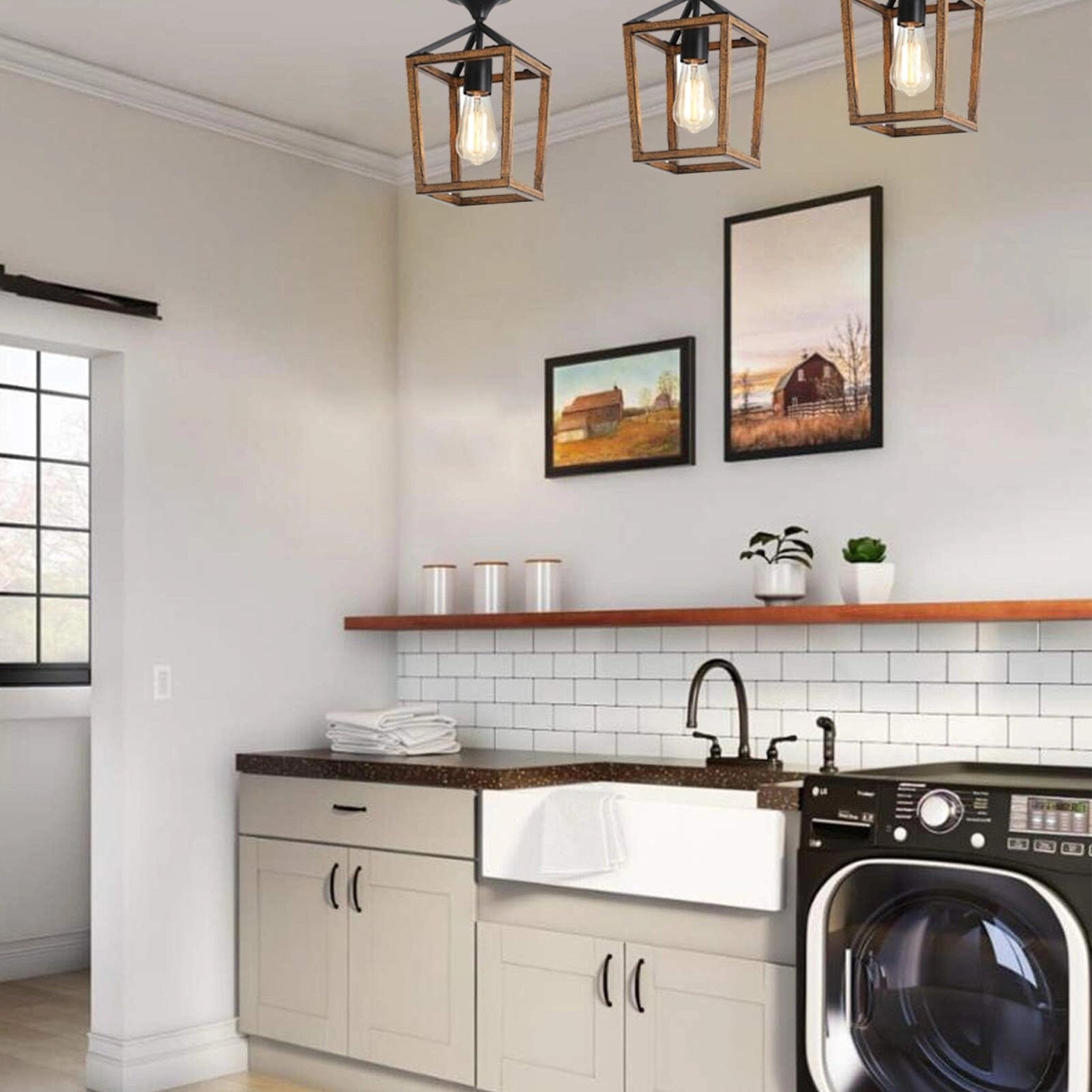 Rustic wooden lantern pendant light with Edison bulb hanging in a farmhouse-style laundry room with cabinetry and window in the background.