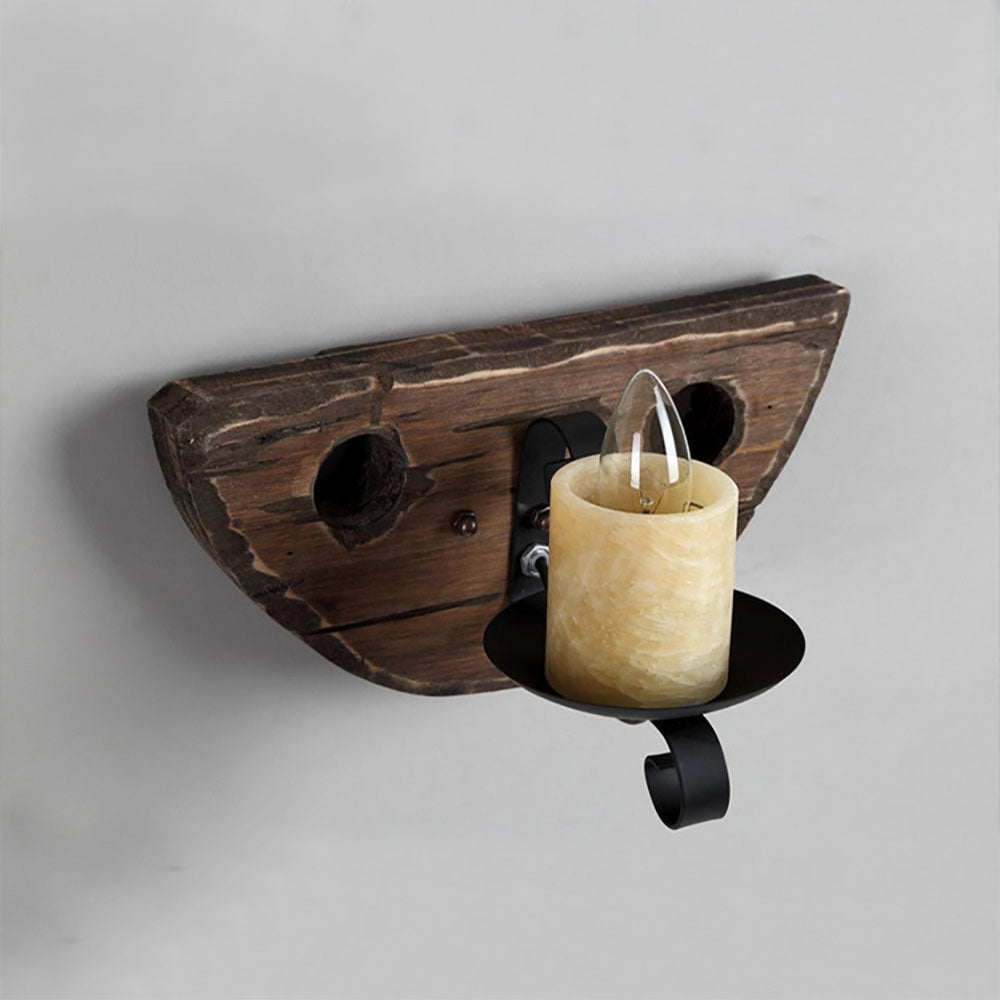 Rustic wooden wall sconce with a vintage design, featuring a candle holder, made of wood and metal, suitable for farmhouse decor.