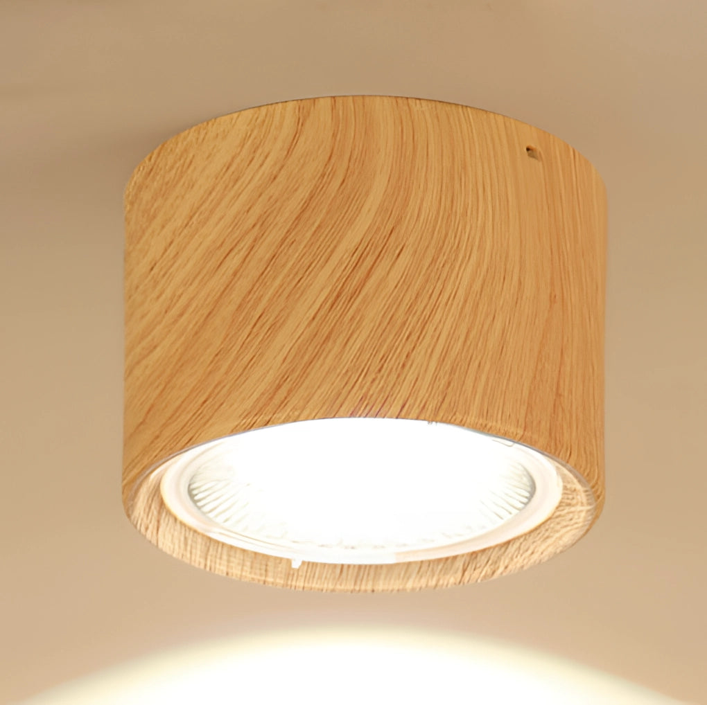Scandinavian LED spotlight with a large wood grain finish, emitting warm 3000K light, mounted on a light wood rectangular base, suitable for modern kitchen lighting.