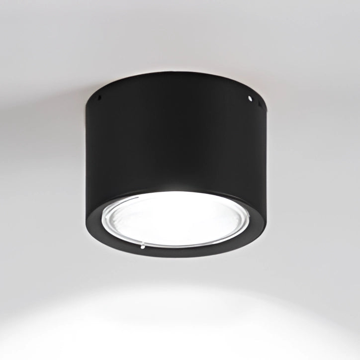 Modern Scandinavian LED spotlight with a light wood finish, featuring a rectangular and cylindrical design, mounted on a ceiling.