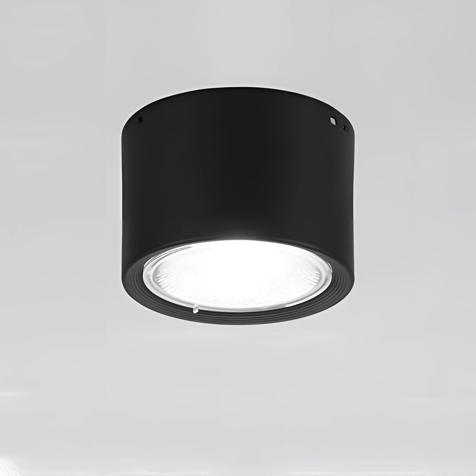 Modern Scandinavian LED spotlight in large black with a warm light (3000K) featuring a sleek, cylindrical design and light wood finish, suitable for contemporary kitchen lighting.
