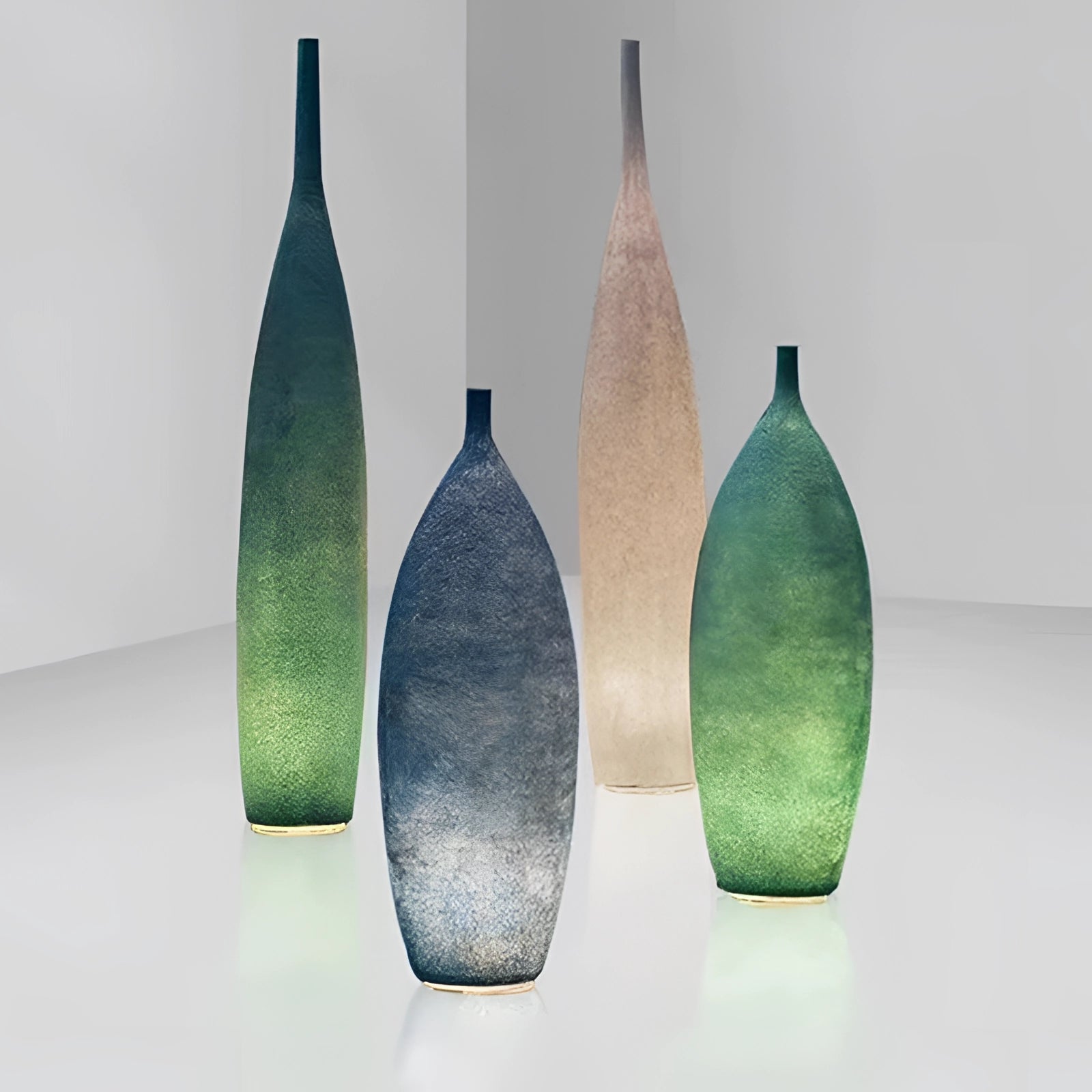 Scandinavian minimalist tall narrow ceramic vase with a distressed finish, showcasing a simple and elegant design ideal for modern home decor.