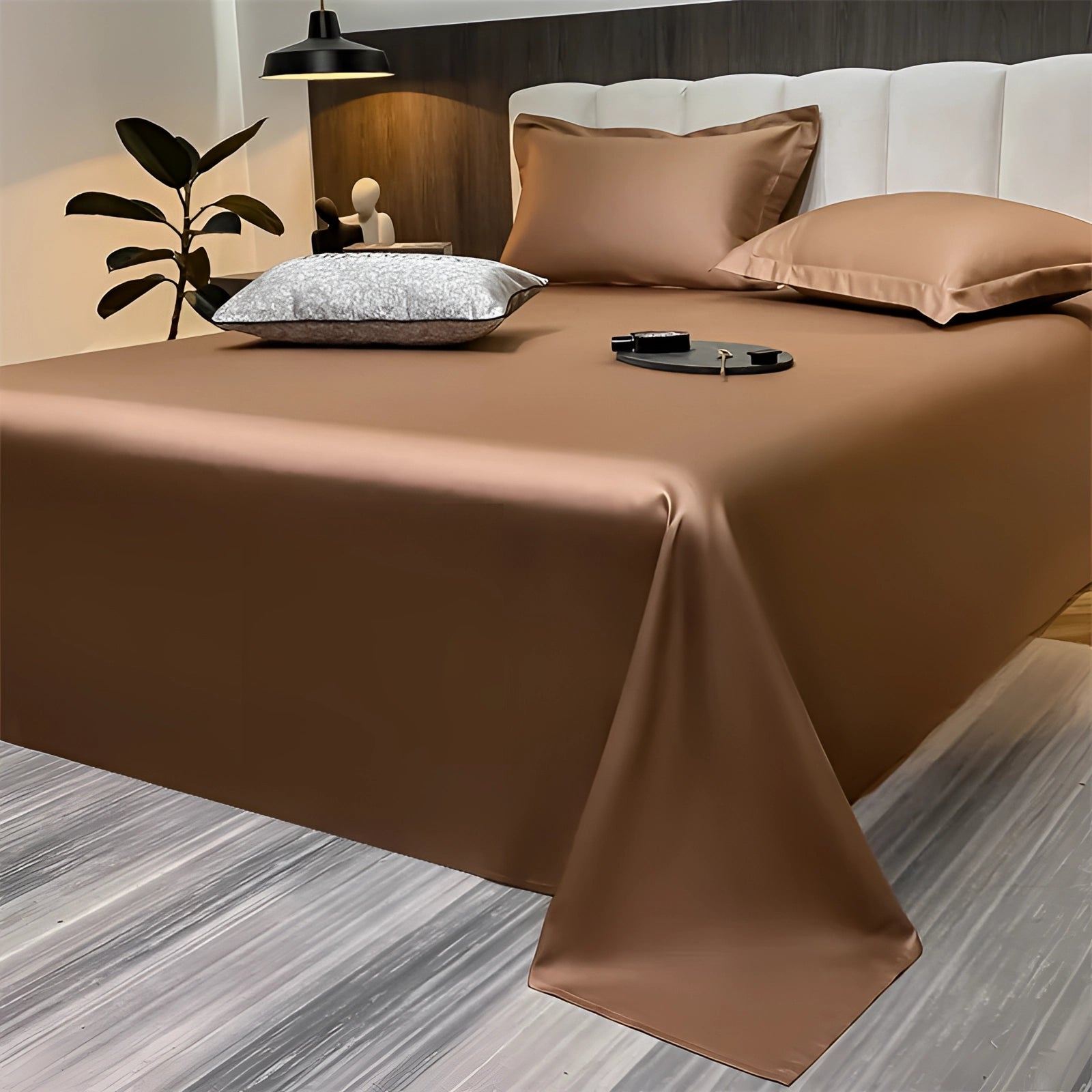 Sea green silky luxury bed sheets draped over a large bed, styled in a modern minimalist decor setting with a 245x265cm dimension, showcasing a smooth and elegant textile design against a contemporary interior backdrop.