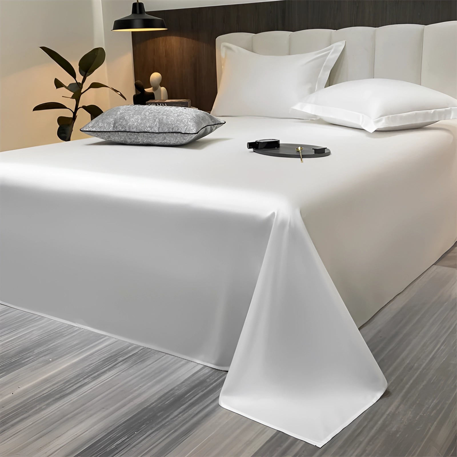 Sea green silky luxury bed sheets in a modern minimalist bedroom setting, featuring a white color scheme and measuring 245x265cm.