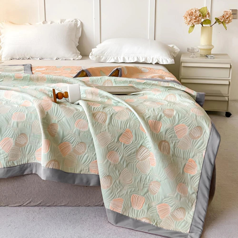 Ocean-inspired duvet cover with pastel beach theme in a 200x230cm size, featuring a serene and comfortable bedroom setting with a white bed frame, soft textiles, and coastal decor elements.