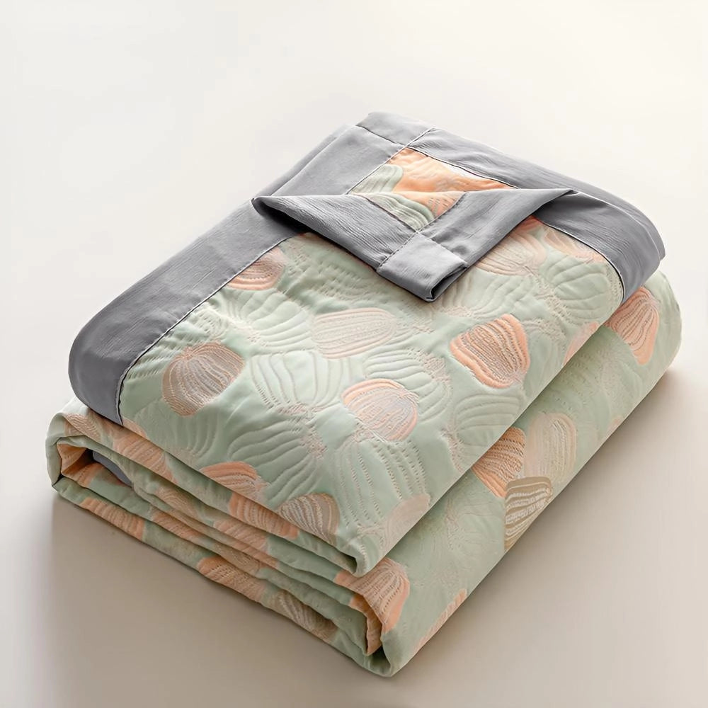 Pastel-colored duvet cover with a seashell and ocean-inspired design, featuring a beach theme pattern.