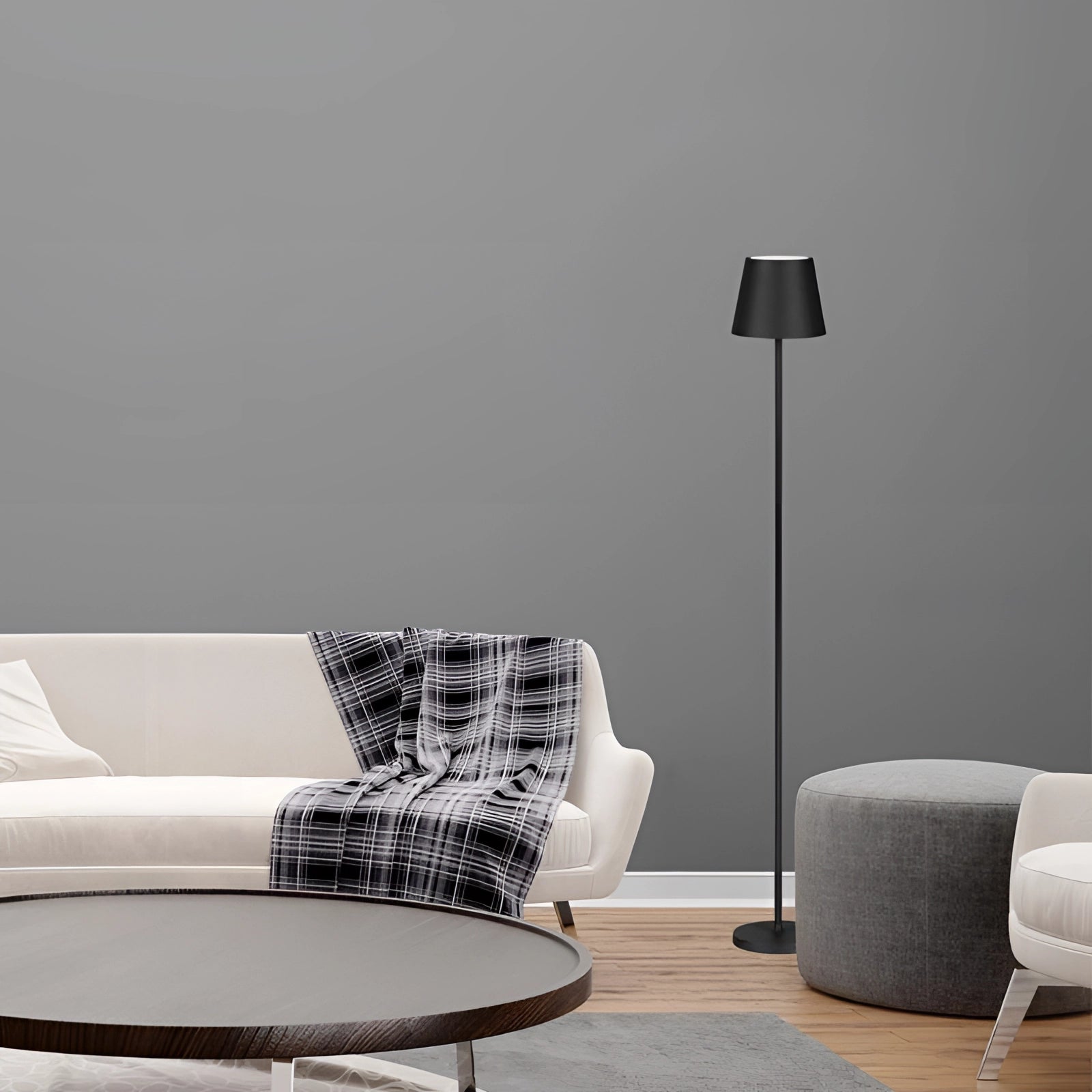 A modern LED floor lamp with a sleek, adjustable design, positioned in an urban home interior setting, featuring a wooden floor and rectangular lines that contribute to a contemporary decor aesthetic.