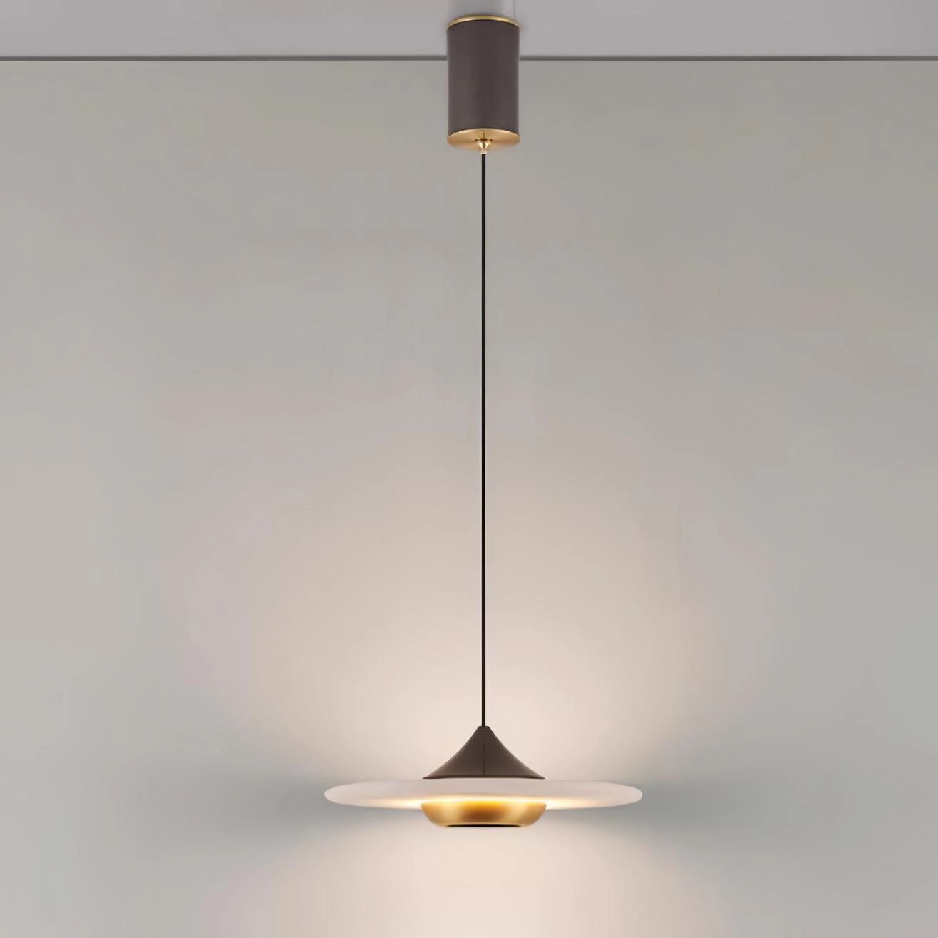 Sleek black LED pendant light with a modern minimalist design, featuring a cylindrical metal lampshade suspended from the ceiling.