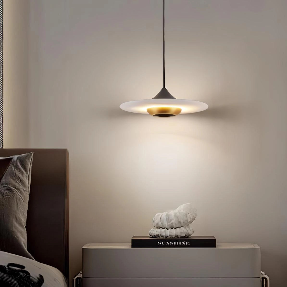A sleek black LED pendant light with a minimalist design, featuring a smooth grey lampshade and subtle wood accents, ideal for modern interior décor.