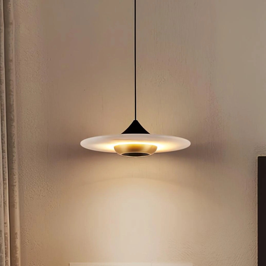Sleek black LED pendant light with a modern minimalist design, featuring a metal and composite material construction hanging from a ceiling.