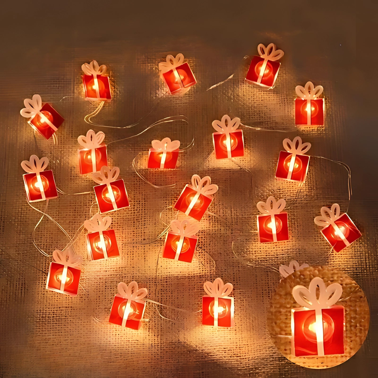 Snowman-shaped LED string lights emitting a warm white glow, ideal for Christmas decor and festive gift-giving.