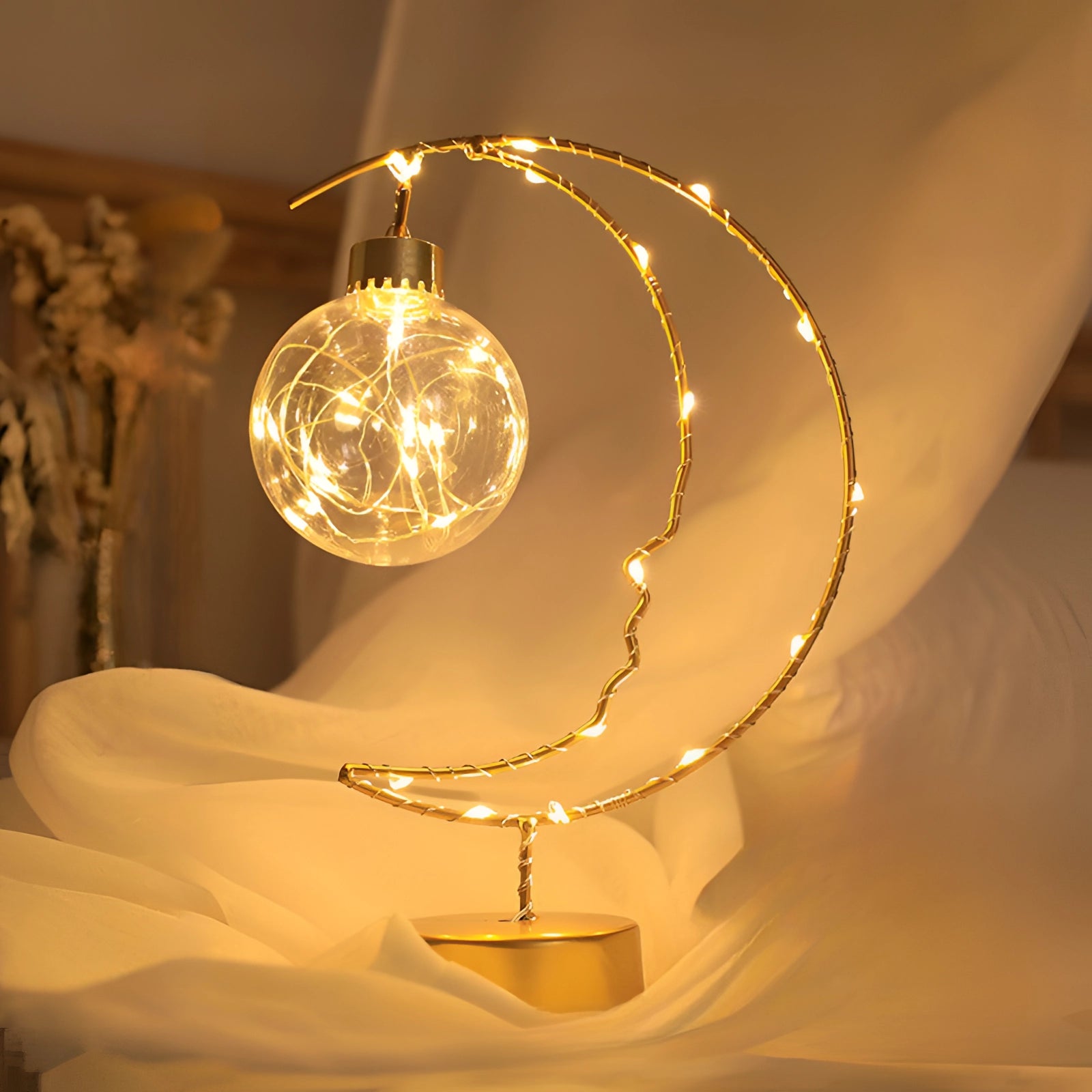 StarryGleam USB LED Star & Crescent Moon Night Light featuring a glowing crescent moon design in amber hues, suitable for bedroom ambiance, showcasing a celestial theme with its star and moon motif.