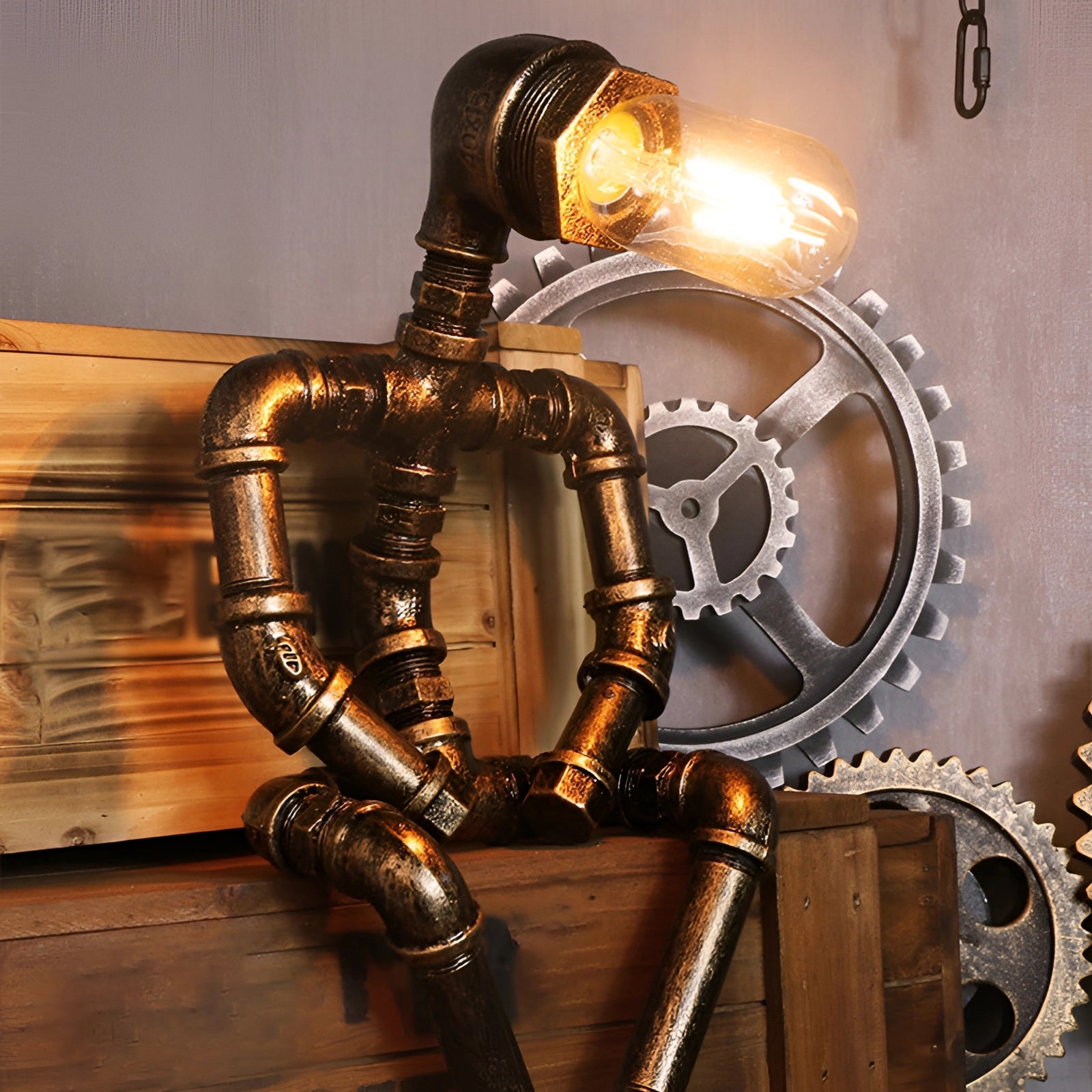 Steampunk Industrial Pipe Table Lamp with vintage gear decor, featuring a unique design combining metal and wood elements, emitting a warm light.
