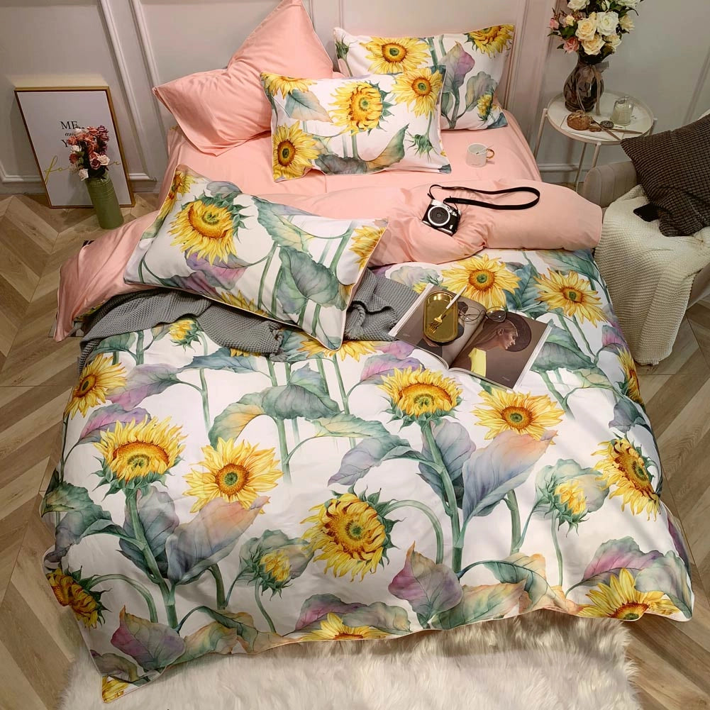 Vibrant yellow sunflower bedding set on a king-size bed with a floral duvet cover, enhancing the comfort and interior design of the room.