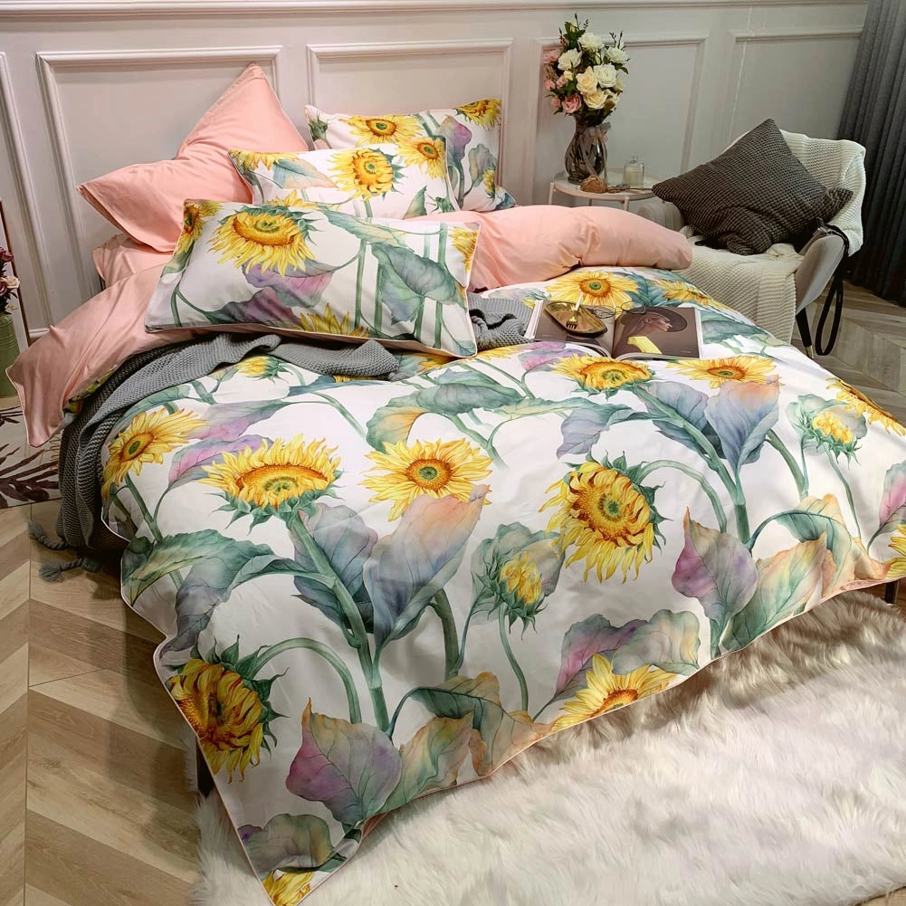 Sunflower Bedding Set in vibrant yellow featuring a floral duvet cover on a neatly made queen-sized bed with matching pillows, surrounded by a tastefully designed interior setting.