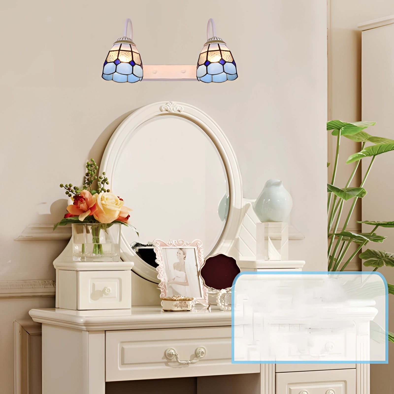 Tiffany Stained Glass Floral Wall Sconce with dual lamp fixture featuring intricate floral patterns in vibrant colors, mounted on a wall with white cabinetry and interior design elements visible in the background.