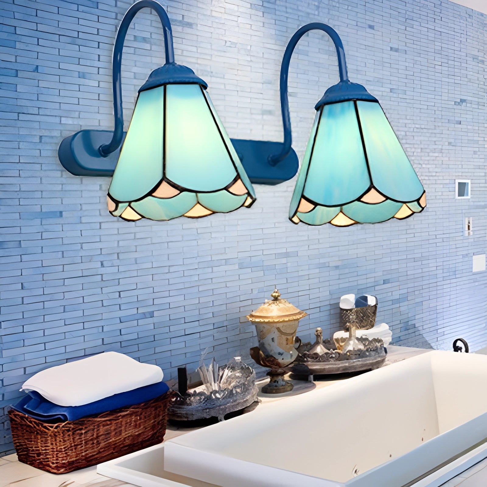 Tiffany stained glass floral wall sconce in blue and ocean hues featuring a dual lamp fixture with intricate floral patterns and warm lighting ideal for interior design.