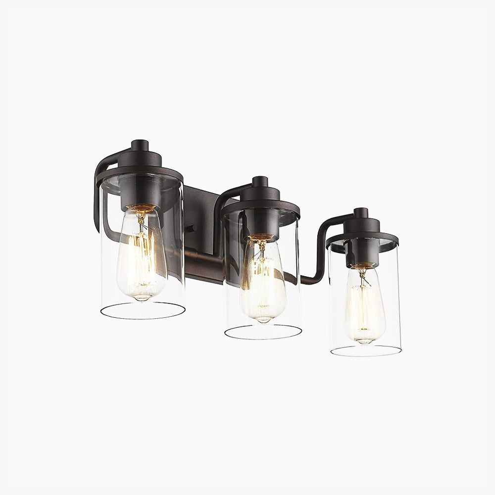A sleek black metal frame triple lantern sconce featuring three clear glass enclosures for lights.