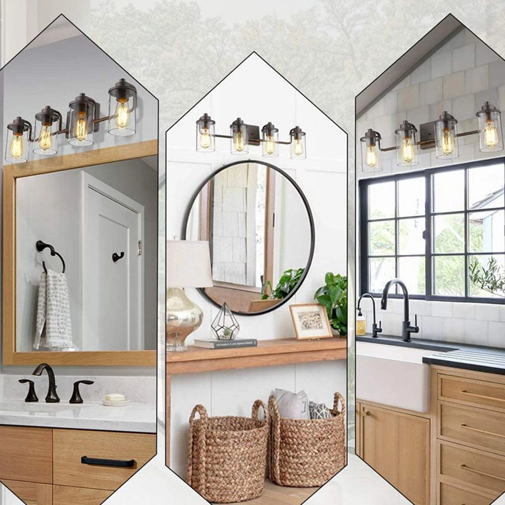 Triple lantern black metal frame 4-light sconce with clear glass, mounted on a white wall above a countertop with cabinetry visible in the background.