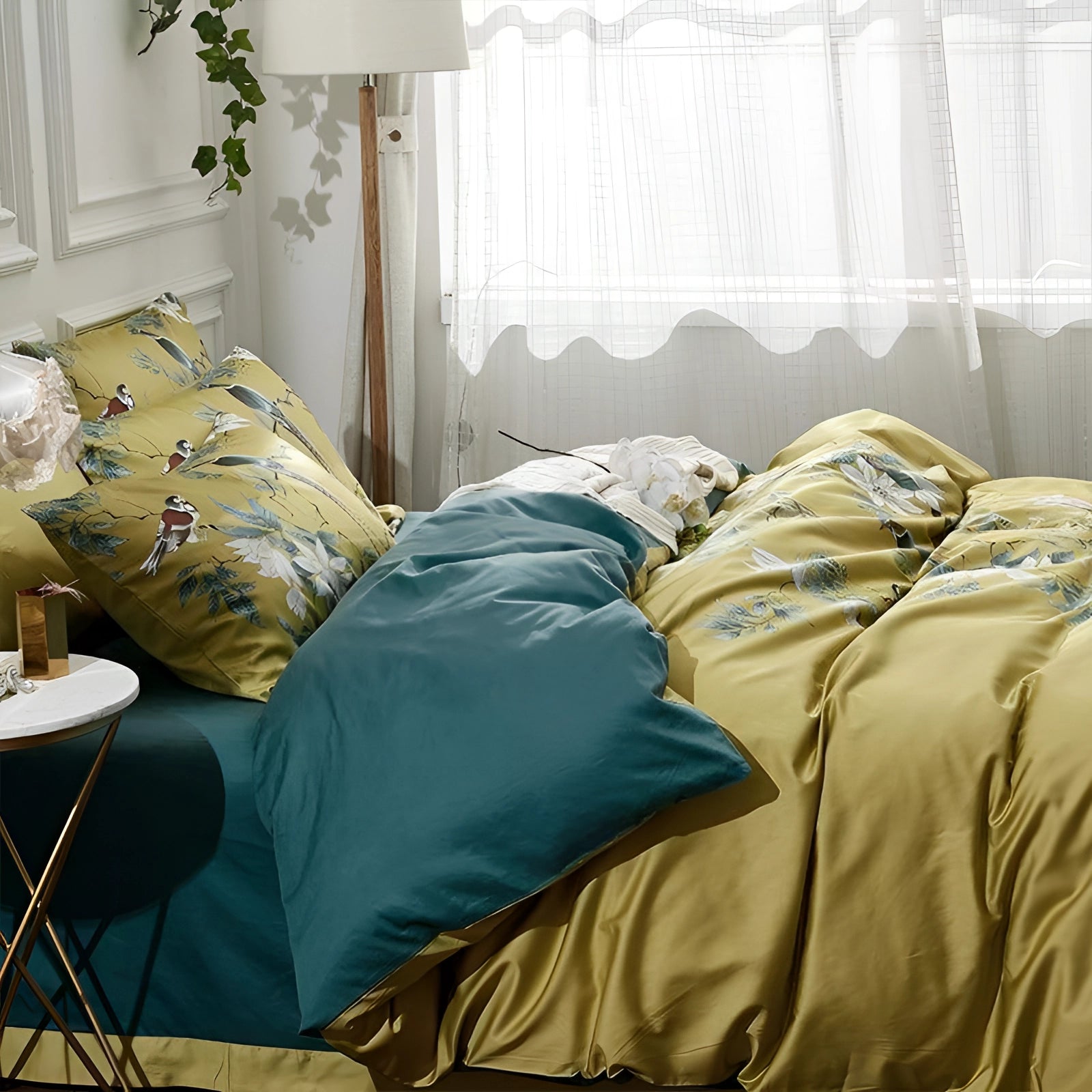 Tropical bedding set featuring a yellow bird print and floral bedspread, displayed in a cozy bedroom with complementary curtains, a wooden bed frame, and a bedside lamp enhancing the interior design.