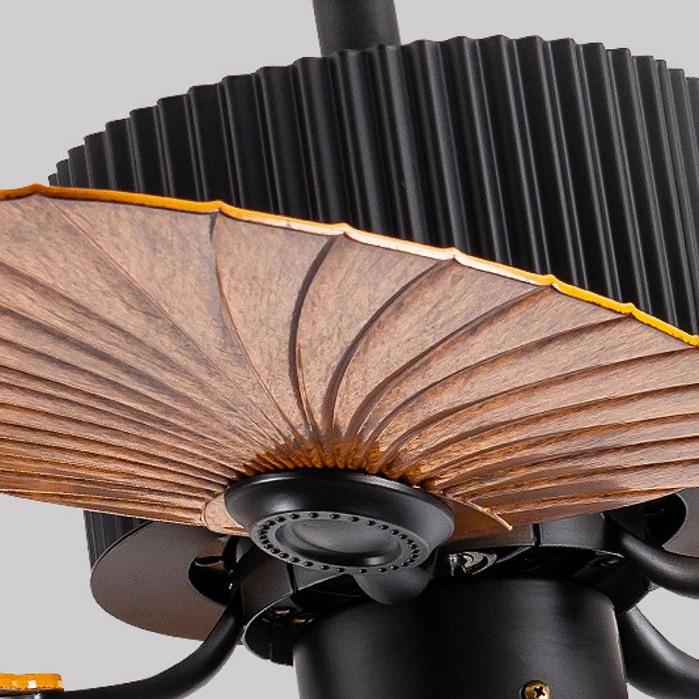 Black tropical indoor ceiling fan with five palm leaf-shaped blades, designed as a decorative home appliance.