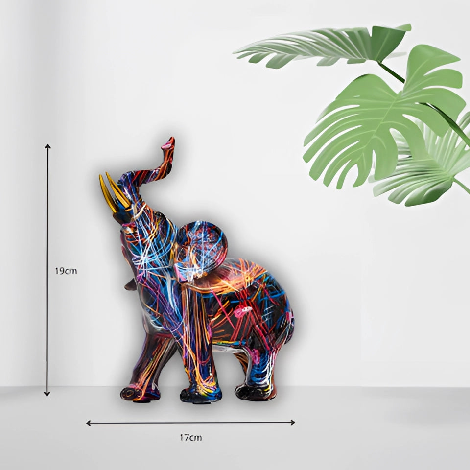 Colorful abstract elephant sculpture with vibrant multicolor patterns, designed as a unique piece of decor. The art piece creatively represents an elephant, blending various colors and abstract forms.