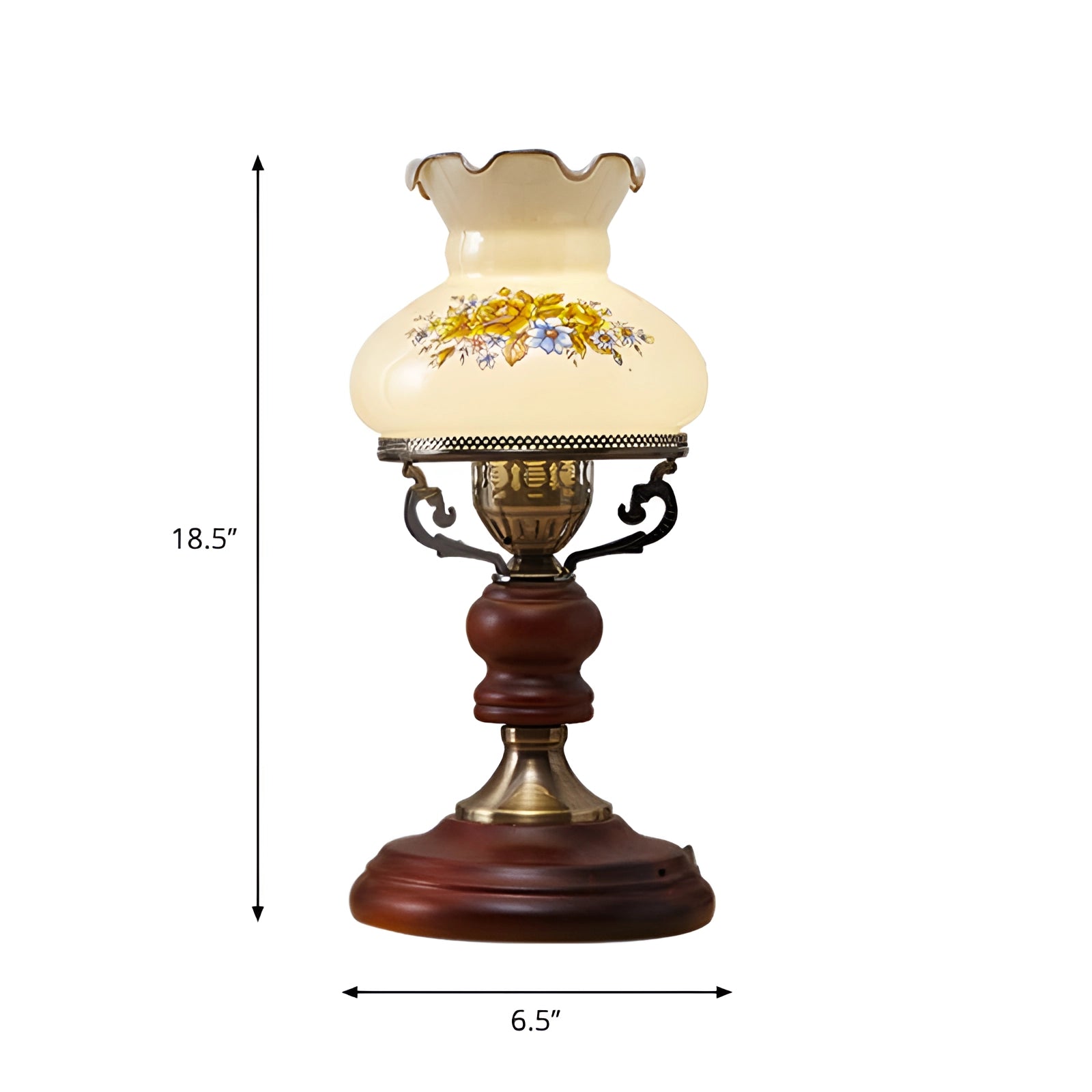 Victorian vintage table lamp featuring a floral lampshade and ornate design, with a glass and metal base positioned on a rectangular table.
