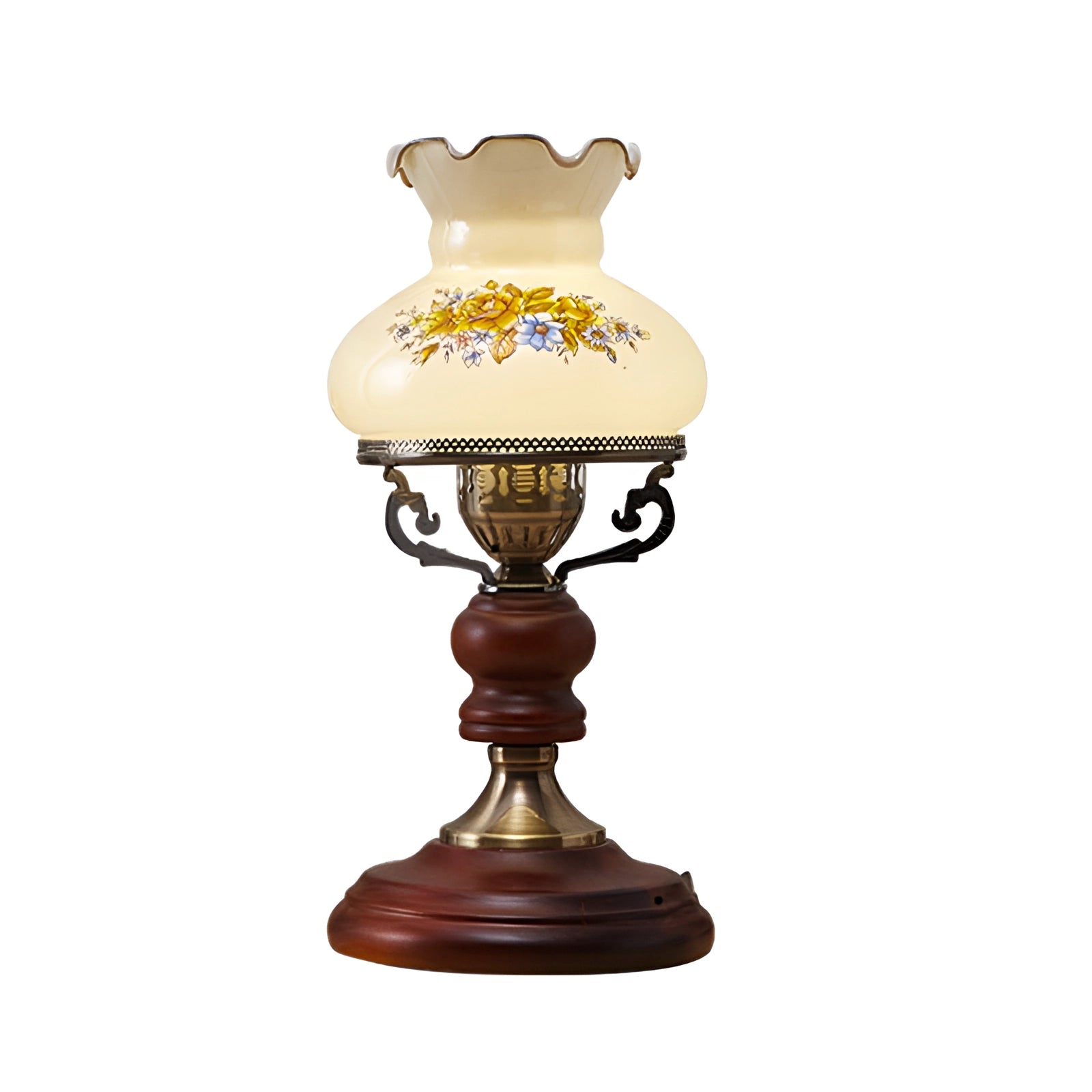 Victorian vintage table lamp featuring a floral lampshade with an ornate design, emitting warm light.
