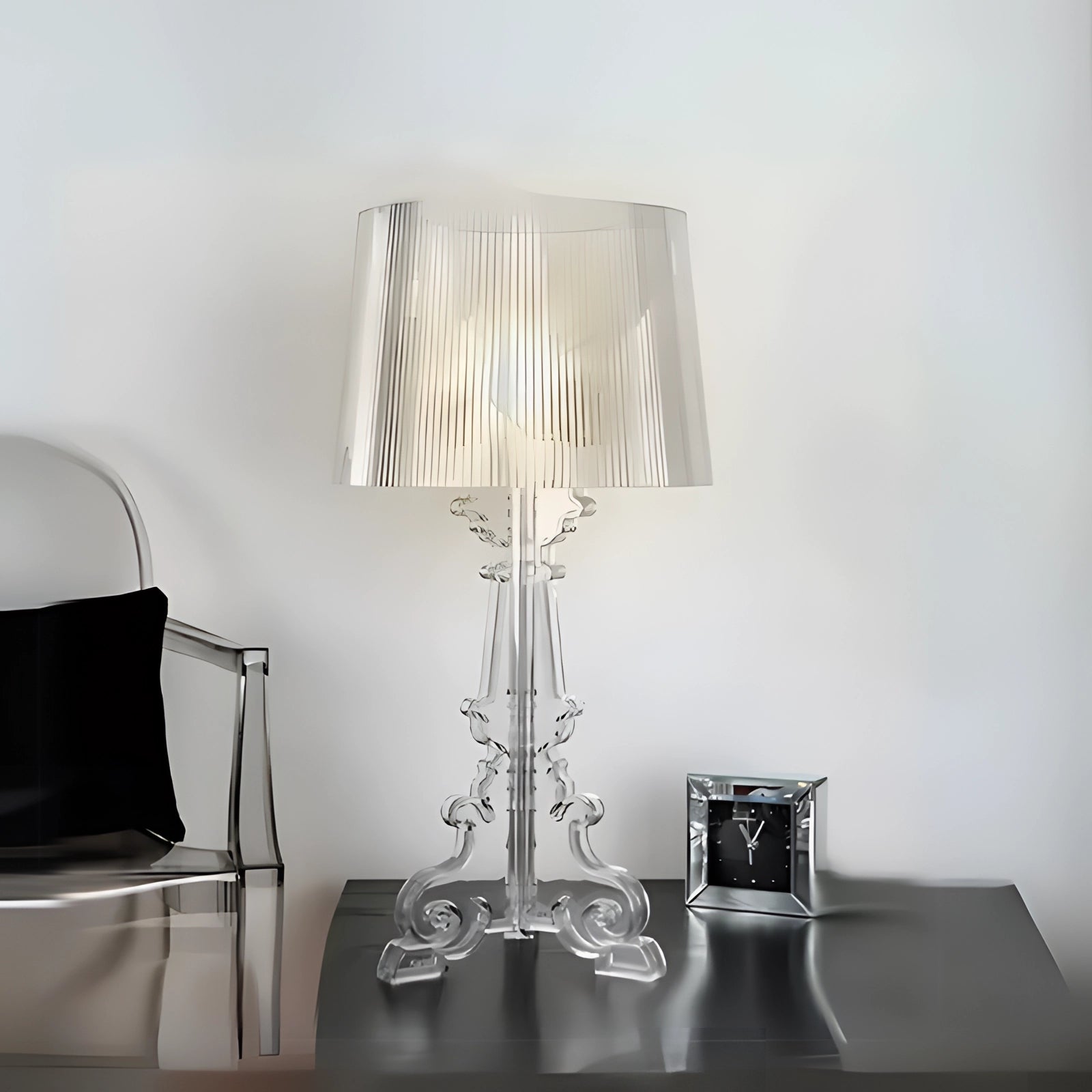 Vintage Baroque table lamp with a black pleated shade and an ornate metal base, displayed in a room with a white variant measuring 73 x 37 cm, surrounded by interior furnishings including a table and chair in a setting with grey tones and artistic elements.