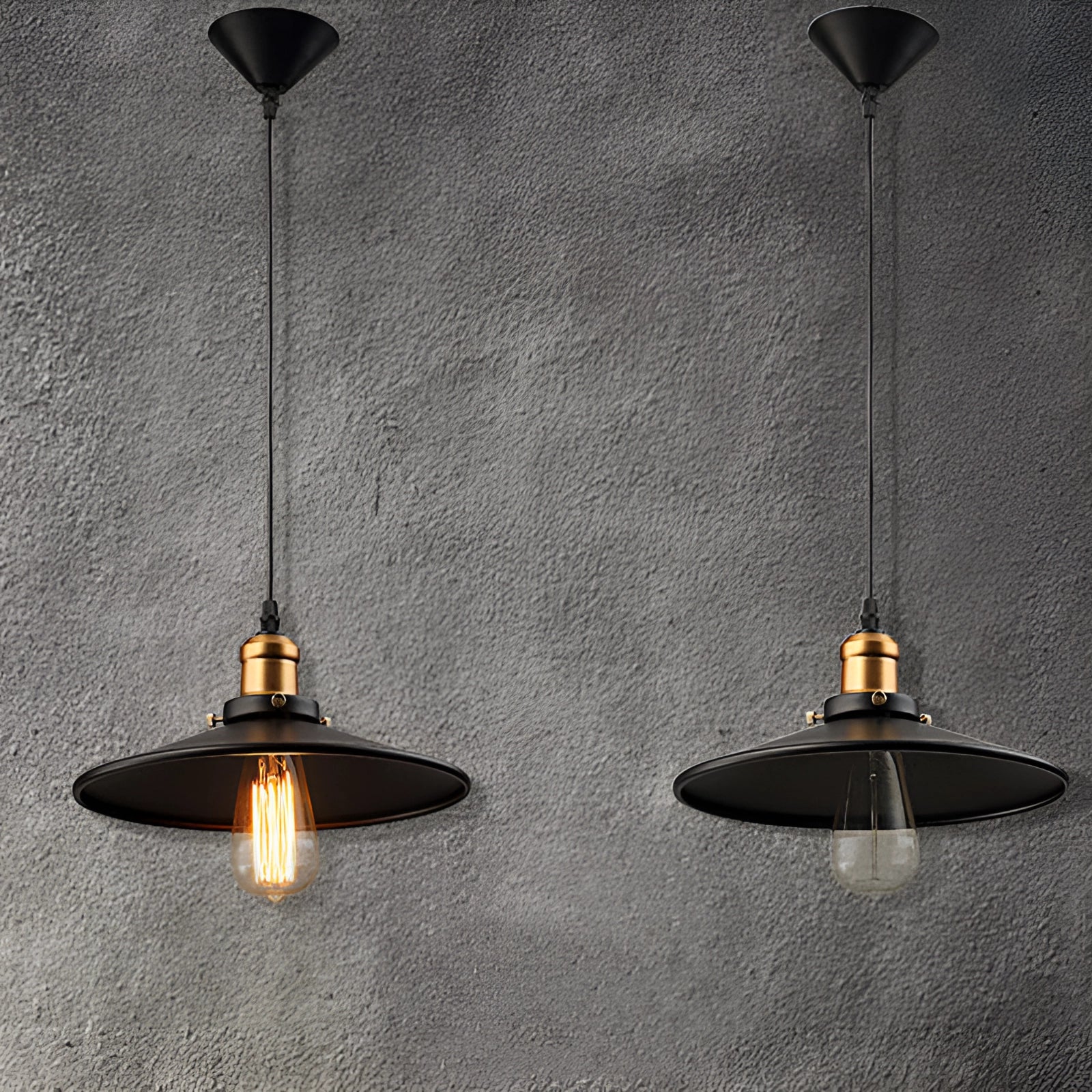 Vintage black Edison bulb pendant light featuring an industrial metallic dome design, suspended from the ceiling.