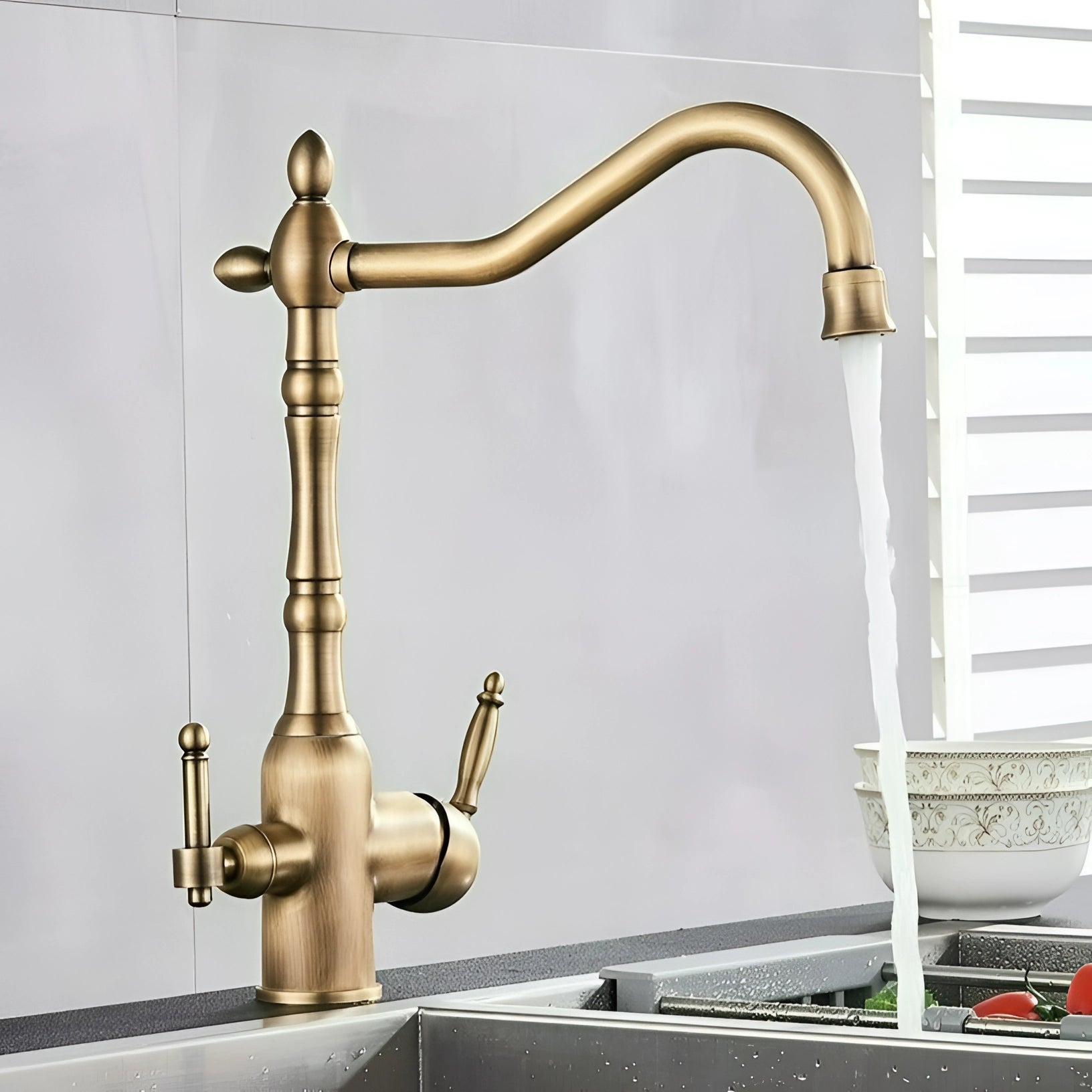 Antique brass vintage black gooseneck kitchen faucet in an antique style, showcasing a sleek and elegant tap design with a sturdy metal construction.