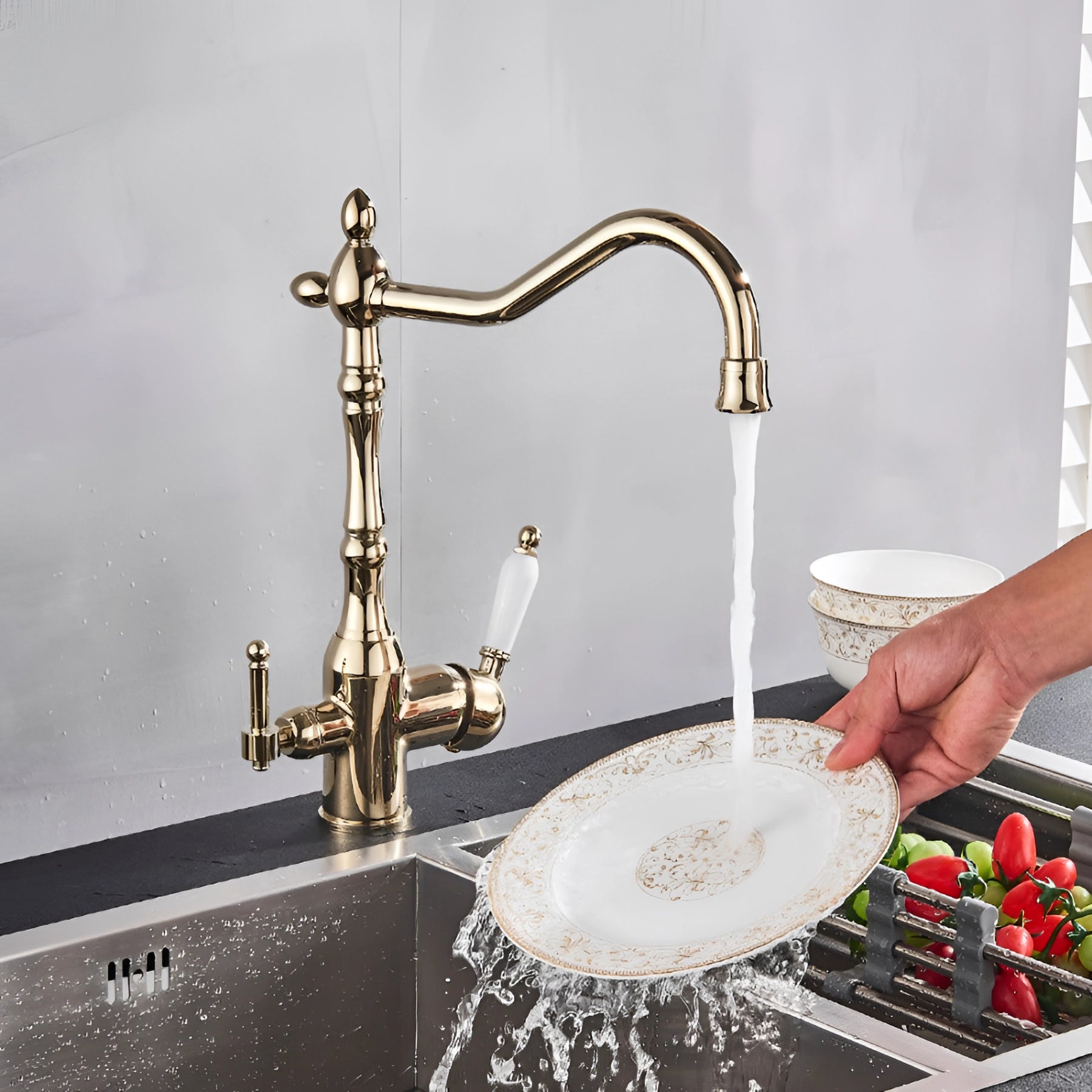 Vintage black gooseneck kitchen faucet with an antique style design, mounted on a countertop near a sink, showcasing its elegant curves and classic finish ideal for traditional kitchen or bathroom settings.