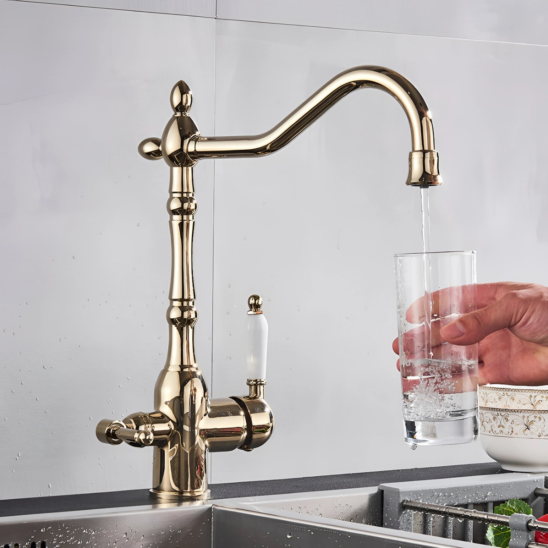 
Gold vintage black gooseneck kitchen faucet with an antique style design, featuring a sleek arched spout and elegant valve handle, suitable for enhancing both modern and traditional kitchen decors.