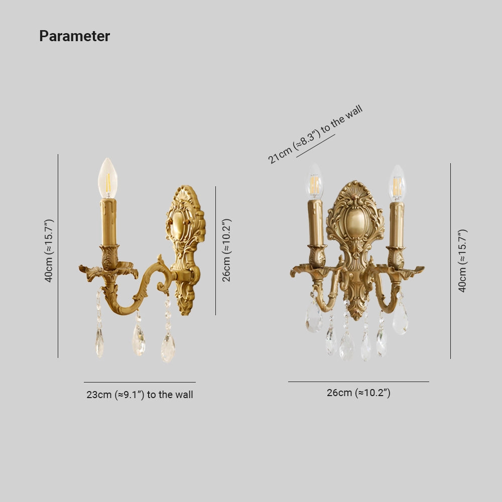 Vintage brass crystal wall sconce with an antique gold finish featuring candle-style light fixture, showcasing a symmetrical metal design with circular elements.