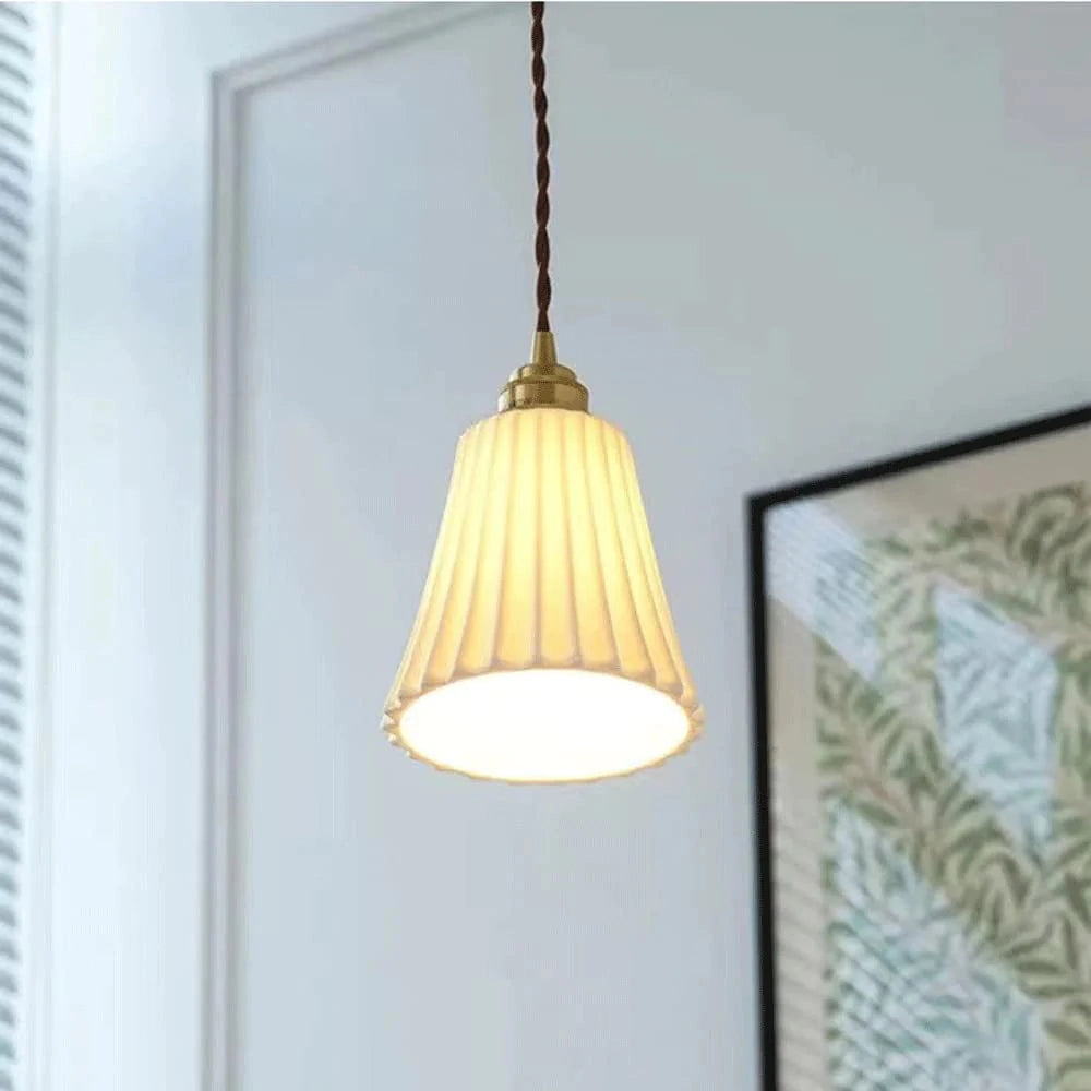 Vintage brass pendant light with a fluted glass shade, designed for dining rooms, featuring a 5.5-inch diameter.