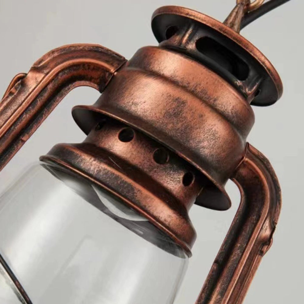 Vintage dual head copper lantern pendant featuring a nautical industrial design, crafted from metal with a weathered finish, suspended by a chain, ideal for adding a rustic touch to interior decor.
