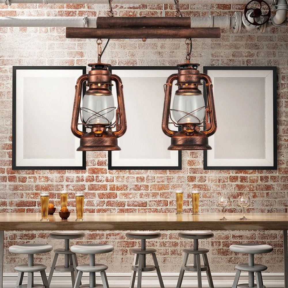 Vintage dual head copper lantern pendant with nautical industrial decor, featuring two copper lanterns suspended by a chain. The pendant lights are designed to enhance interior spaces like kitchens or dining areas, providing ambient lighting with a rustic, maritime charm.