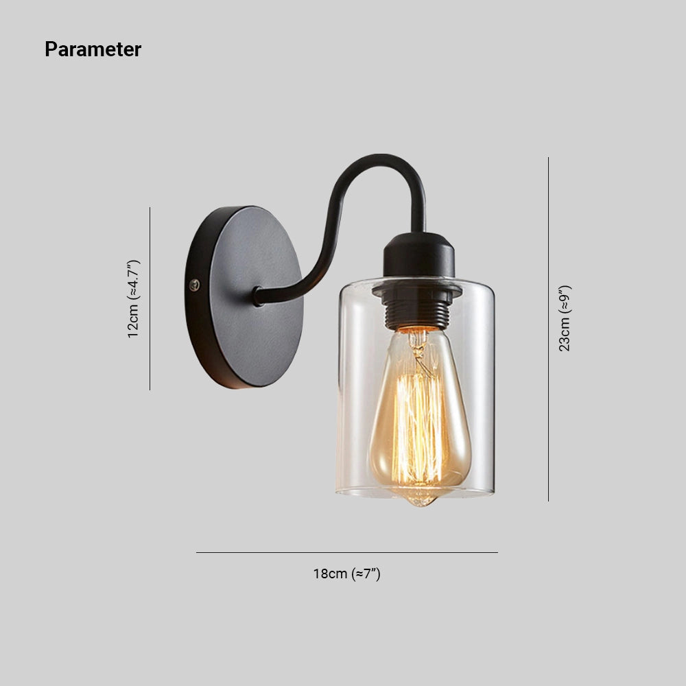 Vintage Edison bulb wall sconce featuring a black metal frame and clear glass shade, showcasing an exposed light bulb.