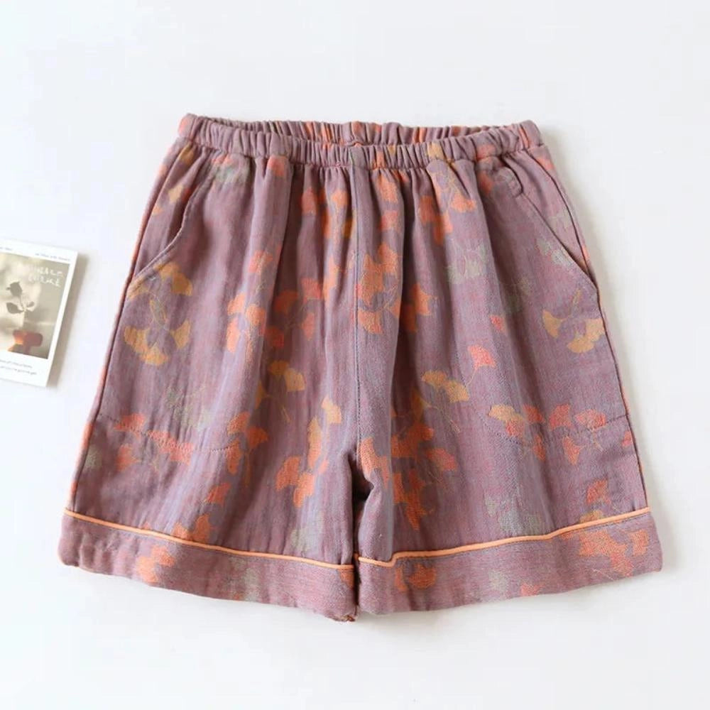 Purple vintage floral bohemian midi skirt with an elastic waist made from lightweight cotton, featuring a vibrant pattern in XL size.