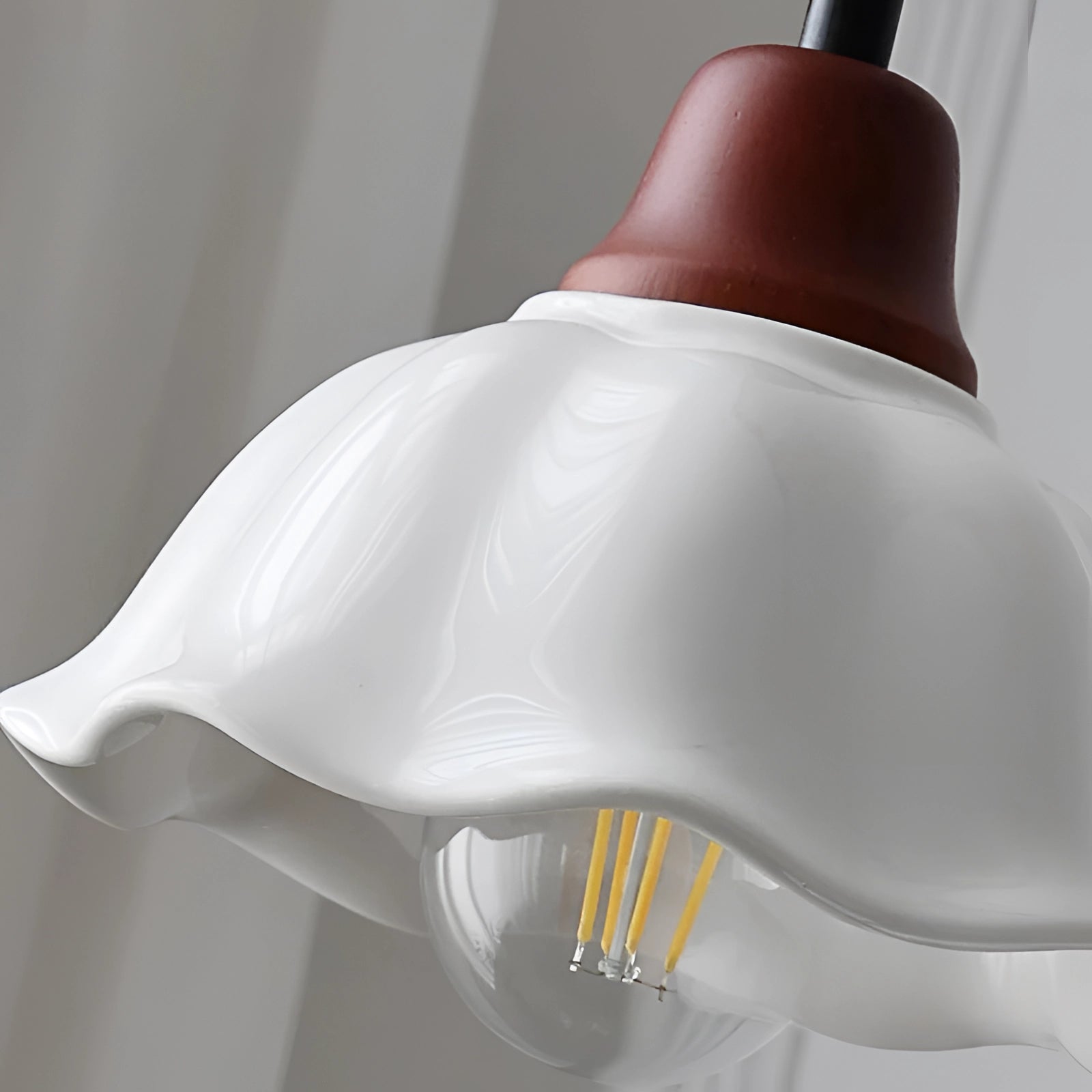 Vintage frosted glass pendant light with a floral design, featuring a decorative metal fixture, suitable for ceiling chandelier decor.