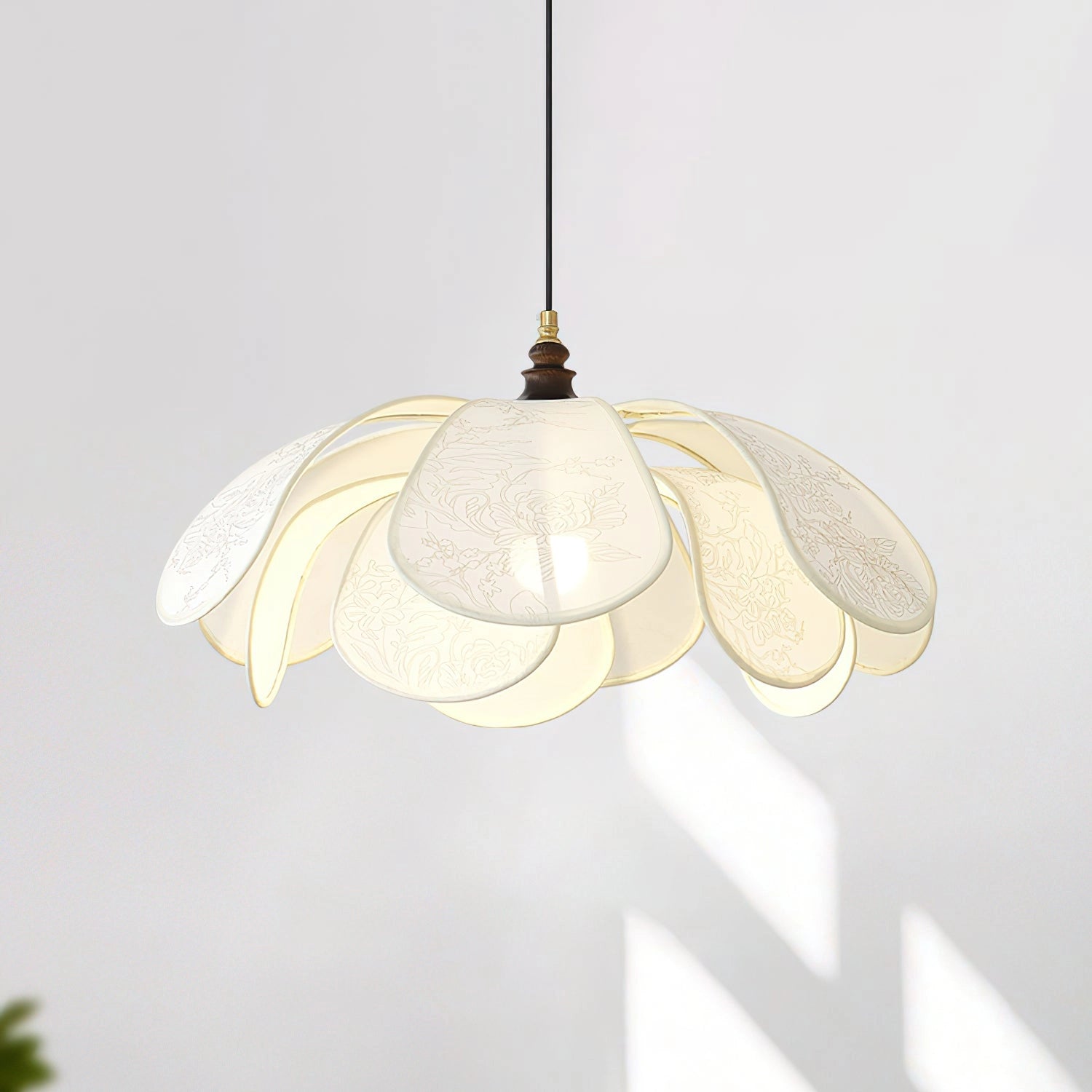 Vintage Floral Pendant Light with Etched Glass Lampshade featuring intricate floral designs, suspended from a ceiling fixture, ideal for dining room decor.