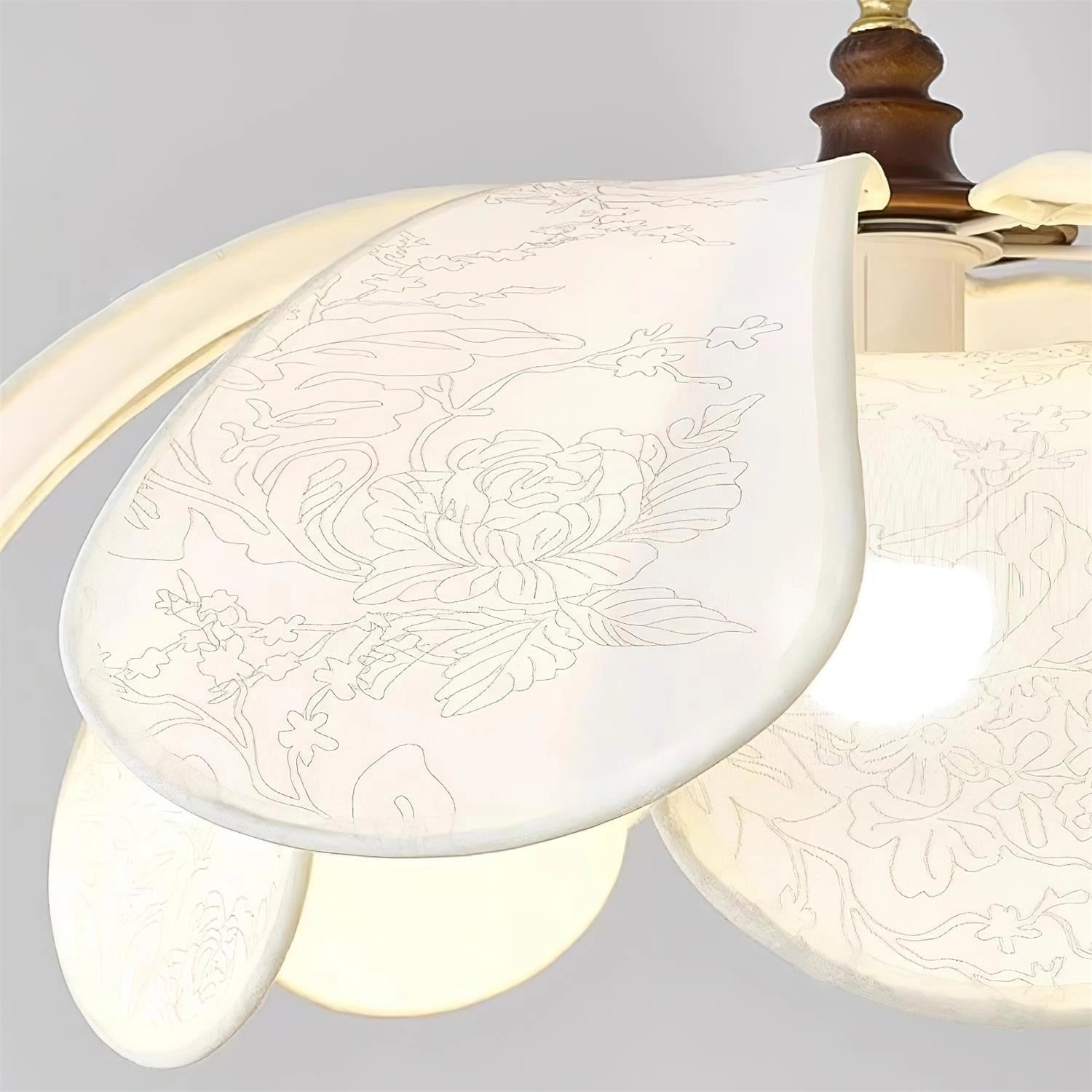 Vintage Floral Pendant Light with etched glass lampshade, hanging in a dining room setting, featuring intricate floral designs and a warm, inviting glow.