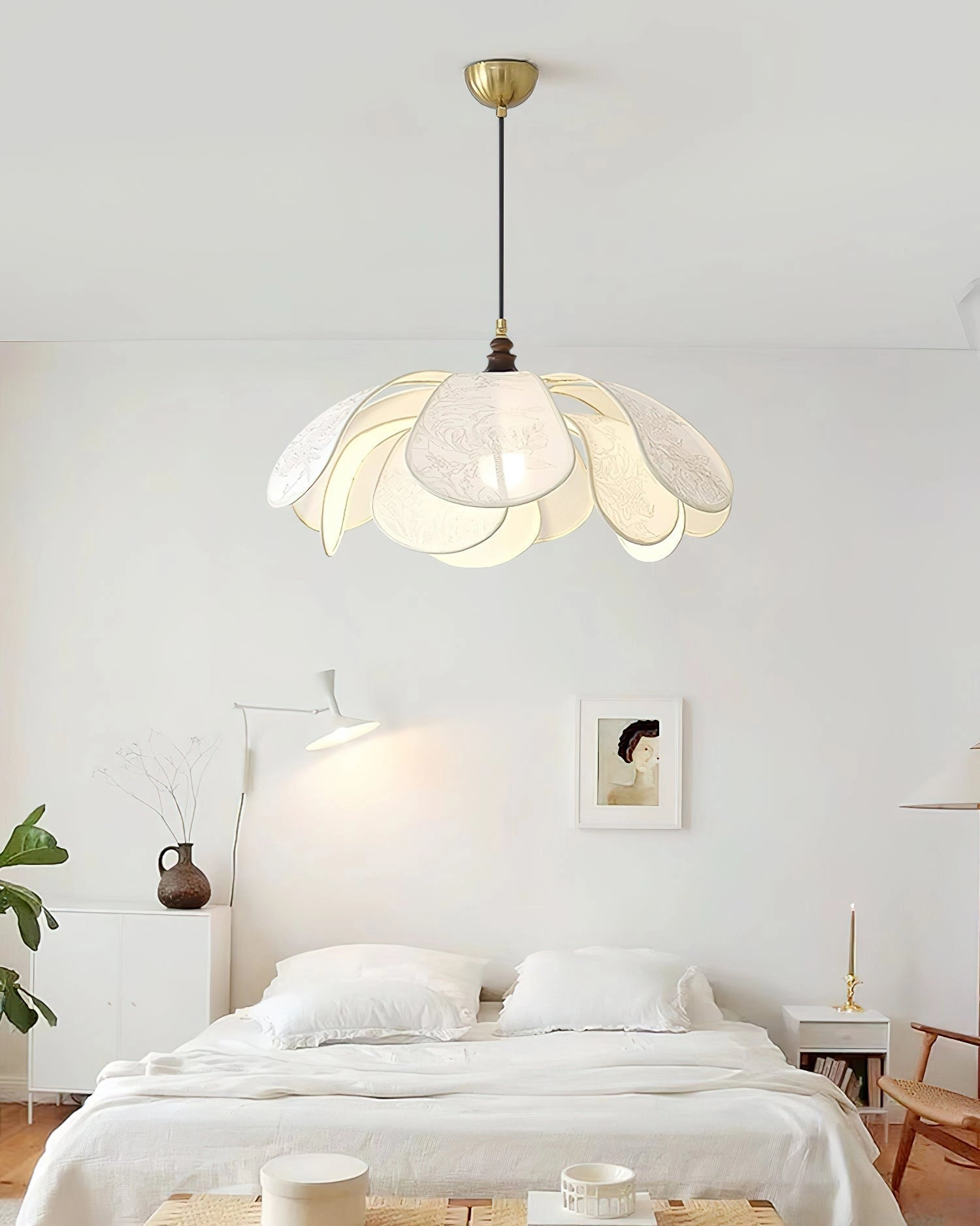 Vintage Floral Pendant Light with Etched Glass Lampshade hanging in a dining room, featuring wooden furniture and white decor elements.
