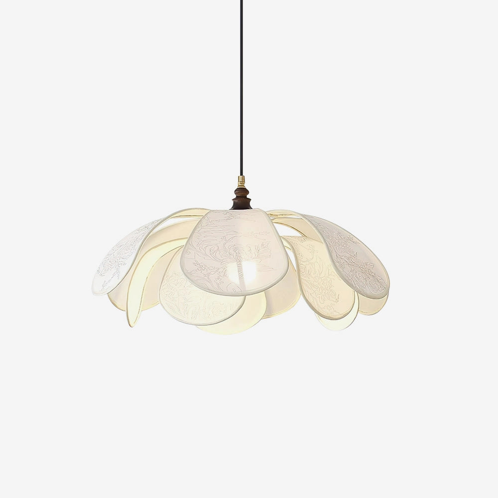 Vintage floral pendant light with etched glass lampshade, beige ceiling fixture with metal accents, hanging in dining room.