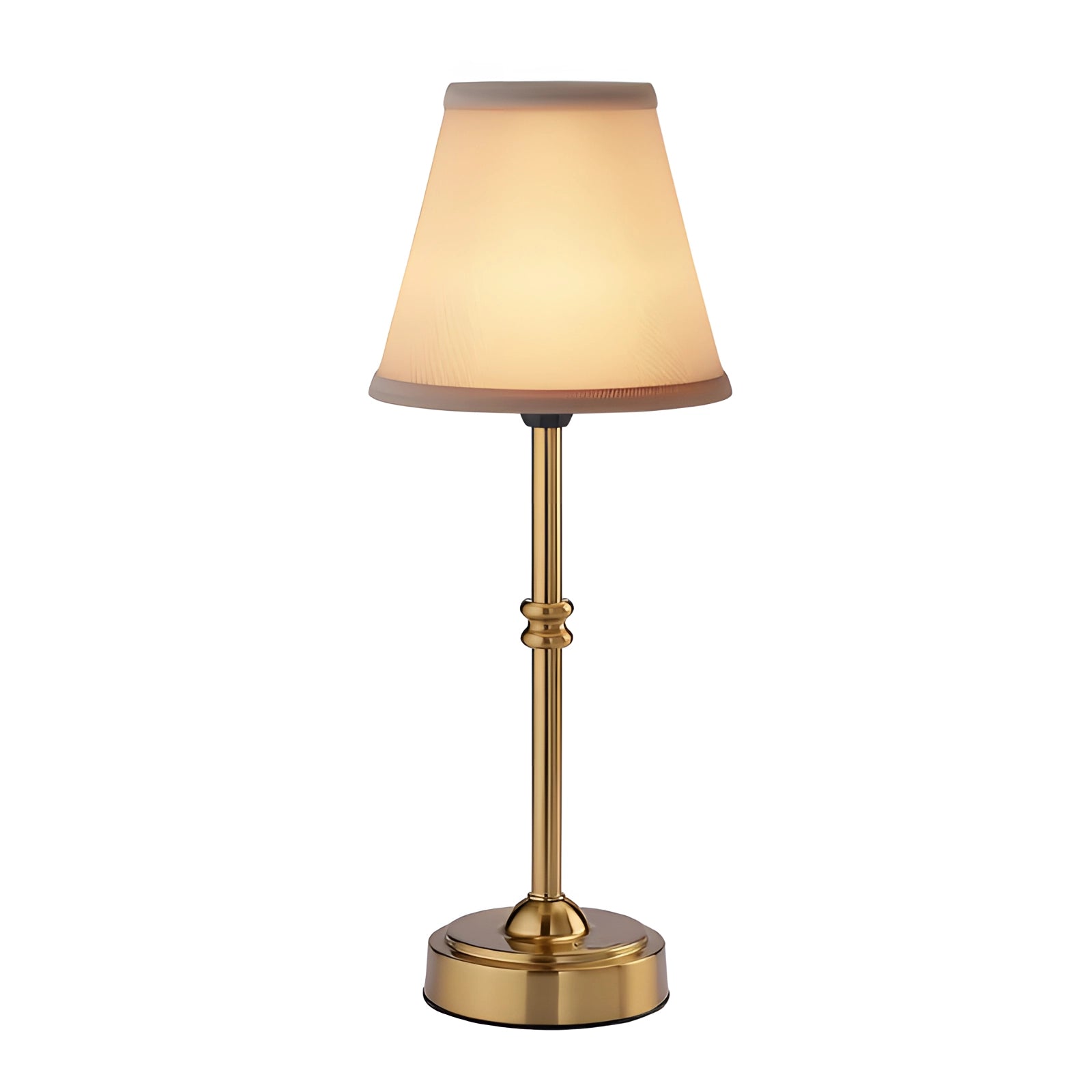 Vintage gold table lamp with a pleated beige lampshade, featuring a classic brass design, placed on a wooden table.